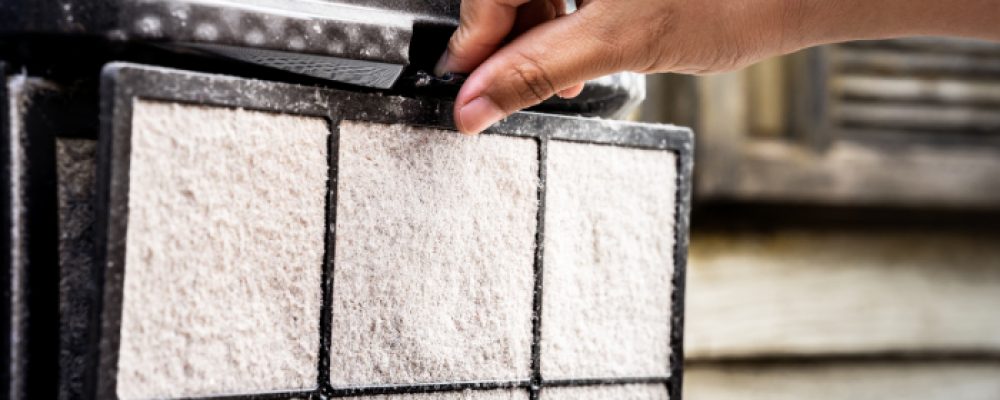 a-human-hand-is-removing-the-filter-of-an-air-puri-2026-01-07-02-20-08-utc (1)